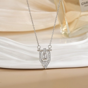 Silver titanium steel necklace featuring a geometric shield pendant with zircon inlay