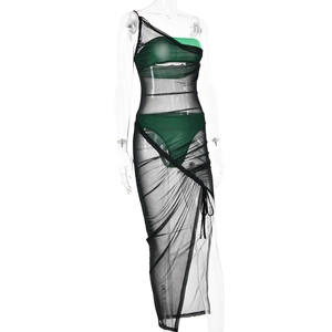 Detail of green bikini set with black sheer mesh one-shoulder cover-up and drawstring