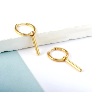 Minimalist gold chain drop earrings on white marble, high quality stainless steel jewelry