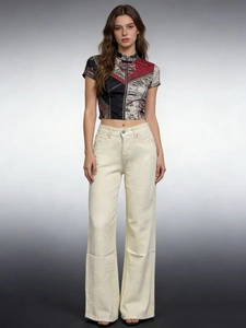 Détail du pantalon en jean taille haute à jambes larges en coton blanc cassé pour femme