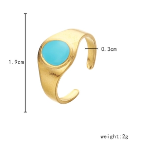 Detail view of golden heart ring dimensions featuring a 1.9cm diameter and blue inlay