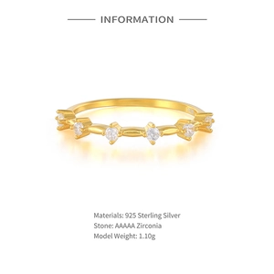 Detail of S925 sterling silver ring with gold plating and AAAAA round zirconia stones