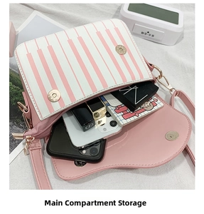 Macro detail of the spacious main compartment inside the piano note pattern handbag
