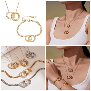 Detailansicht von ineinandergreifenden Ringen Halskette und Armband Set in 18k Gold