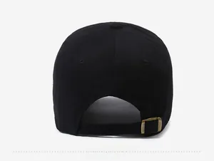 Detail view of cotton baseball cap back with adjustable vintage bronze metal buckle