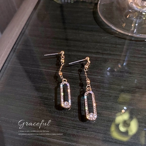 Elegant gold finish long tassel drop earrings with sparkling rhinestones for women