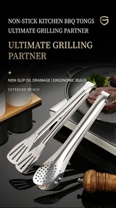 Close-up of polished stainless steel kitchen tongs with oil drainage holes and ergonomic grip