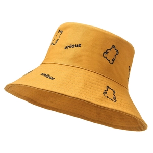 Yellow cotton bucket hat with unique bear embroidery for summer sun protection outdoors