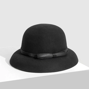 Elegant French style black silk linen cloche bucket hat with a minimalist bow detail