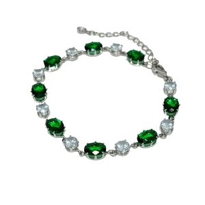 Bracelet ovale en zircon vert émeraude et cristaux blancs en finition argent