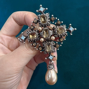 Vintage Baroque cross brooch with amber gemstone and hanging pearl pendant in silver finish