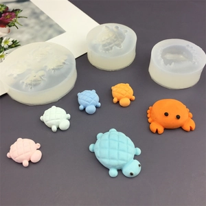 Silicone molds for turtle and crab crafts with finished resin and clay decorations