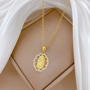 Gold stainless steel oval Virgin Mary necklace with cubic zirconia stones on silk fabric