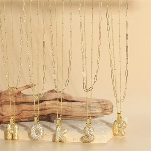 Double-layer gold bubble letter pendant necklace with pavé zircon in 3D design