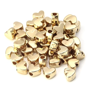 Bulk shiny gold heart-shaped loose beads with holes for DIY jewelry making and crafts