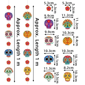 Mexican Day of the Dead hanging decorations with colorful paper skull and floral designs