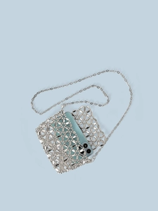 Chic silver metal woven crossbody bag with hollow design and fine chain strap