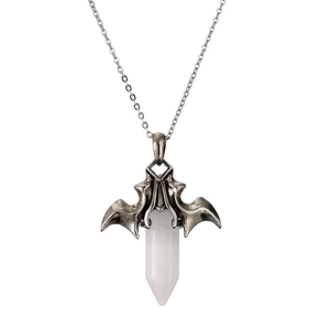 Macro detail of gothic bat wing pendant with hexagonal white opal crystal on silver chain