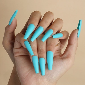 Matte blue long coffin fake nails for women in professional hands display