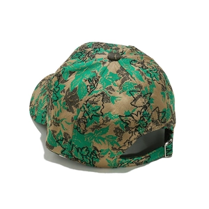 Rear view of khaki floral baseball cap showing adjustable strap and metal buckle detail