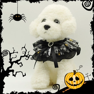 Halloween pet collar with spooky castle print, black bow, and skull charm for cats and dogs