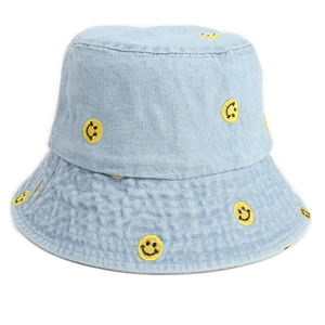 Light blue denim bucket hat featuring embroidered yellow smiley faces for women
