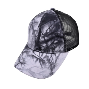 Detail of tie-dye mesh baseball cap with breathable black net and adjustable back