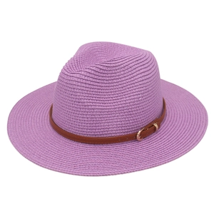 Detail of purple woven Panama hat with brown leather strap and golden buckle accent