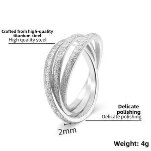 Macro shot of 2mm width titanium steel triple band ring with frosted sand surface
