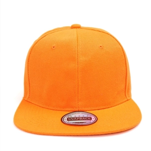 Close-up of orange snapback hat featuring breathable eyelets and laser quality sticker