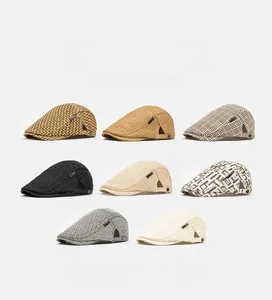 Collection of men's straw flat caps in various woven patterns and summer colors