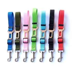 Adjustable nylon pet car seat belts in seven vibrant colors for small to large dogs