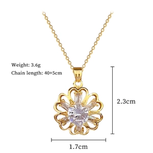 Detailed specs of floral pendant necklace featuring gold plating and cubic zirconia accents