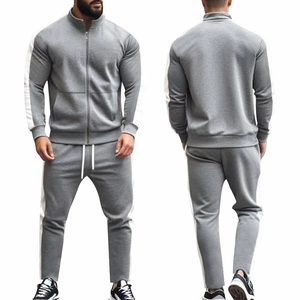 Men's light grey two-piece tracksuit featuring zip-up jacket and matching joggers