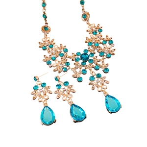 Vintage gold hollow flower necklace and earrings set with teal teardrop crystal pendants