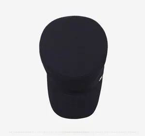 Top-down view of a classic navy blue flat top military style cap made of thick cotton fabric