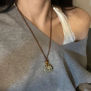 Faux leather mini bag pendant necklace with marble pattern for women fashion styling