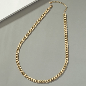 Polished gold Cuban link chain with secure lobster clasp and adjustable ball pendant