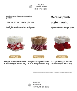 Detailed view of three red plush Christmas mini boots for tree hanging and decoration