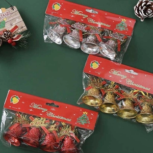 Christmas tree bell ornaments set in gold silver and red with festive bows on dark background