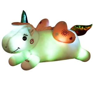 Luminous unicorn plush toy in white with glowing green LED and metallic rainbow horn