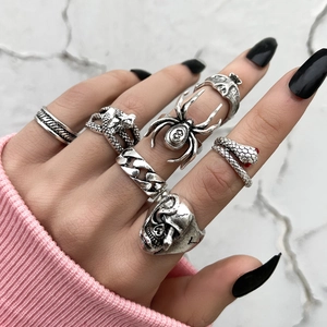Gothic silver alloy ring set featuring spider, skull, and snake designs on fingers