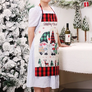 Christmas forest gnome apron with red black plaid pattern and Merry Christmas text
