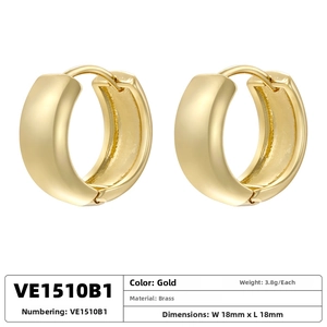 Detailed view of polished 18K gold-plated brass hoop earrings measuring 18mm by 18mm