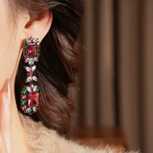 Vintage palace style drop earrings with red and green crystals on black base