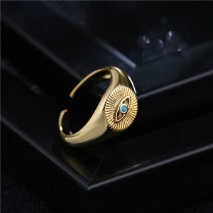 Evil eye design 18K gold plated open ring with turquoise stone and sunburst pattern