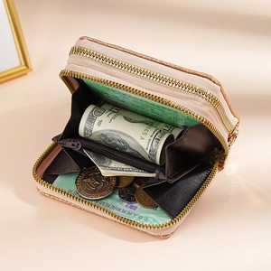 Sparkly pink double zipper accordion card wallet with gold hardware and multiple slots