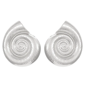 Macro shot of silver conch spiral stud earrings with textured carving on white background