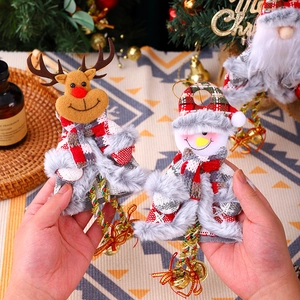 Christmas plush ornaments set featuring Santa and reindeer with festive gold bells