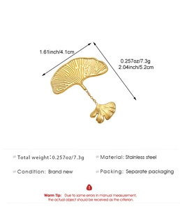 Macro detail of golden ginkgo leaf brooch in stainless steel with size measurements